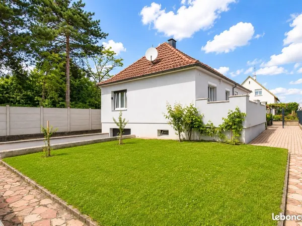 Colmar - maison familiale avec jardin, garage et beau potentiel