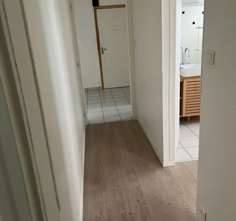 Appartement 78 M2 RDC en résidence 2 chambres avec garage