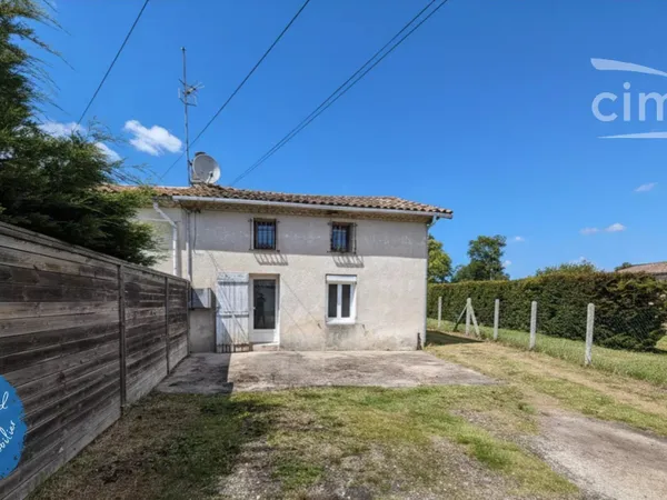 Charmante maison avec jardin et dépendance à REIGNAC 33