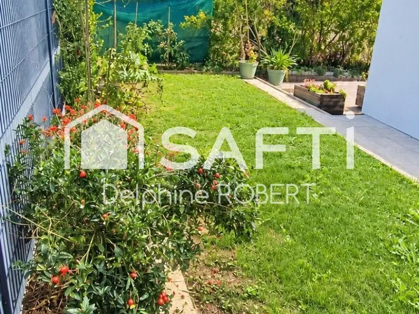 Appartement 2 chambres - Jardin - Place de parking