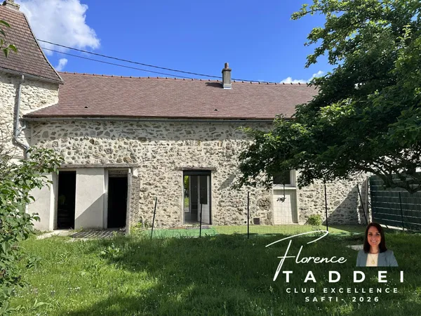 Fort potentiel pour cette maison de ville avec jardin, cave, et espace de stockage.