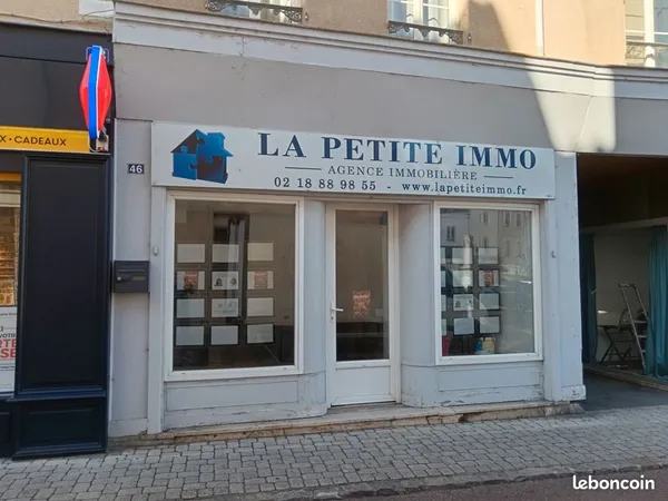 Local commercial plus appartement