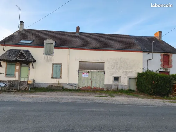 Maison individuelle avec garage et atelier