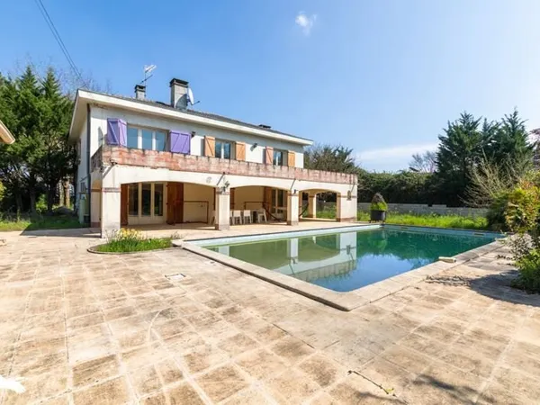 Maison 8 pièces 213 m²