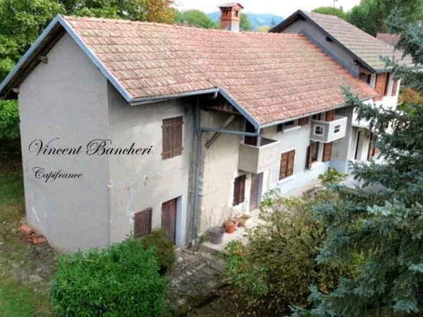 PERS-JUSSY, Maison des années 60 avec beau potentiel dans un environnement calme et champêtre