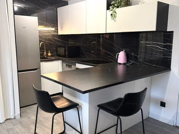 Appartement rénové avec jardin privatif et parking