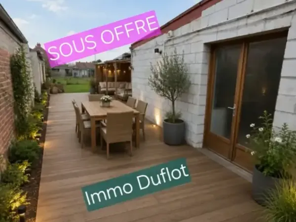 Maison avec jardin et garage : à saisir !