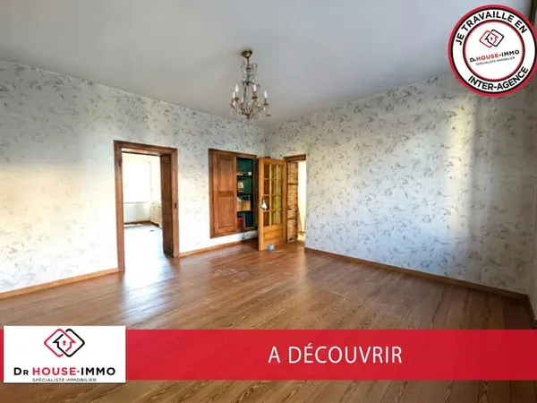 Maison mitoyenne d'environ 102 m² avec jardin - Un beau potentiel à révéler !