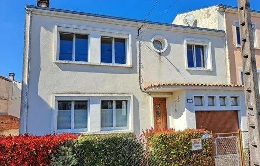 MAISON FAMILIALE EN VILLE