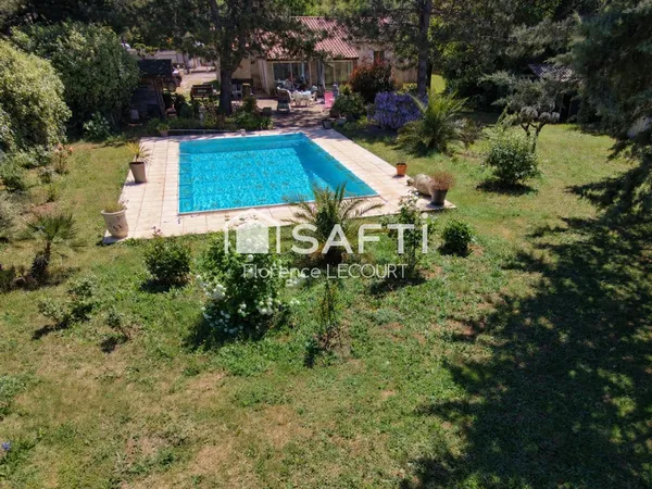 Maison 4 pièces garage piscine terrasse véranda