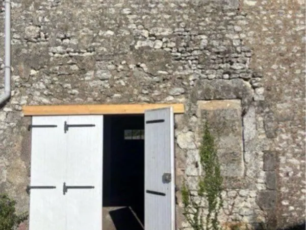 Grand garage/dépôt de 52 m2 avec jardin
