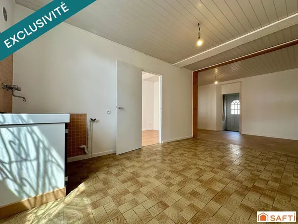 Appartement en rez-de-chaussée avec garage