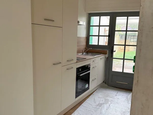 Petite maison plain-pied avec jardin