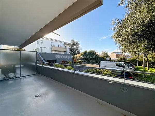 Appartement T3 avec jardin, balcon et double stationnement