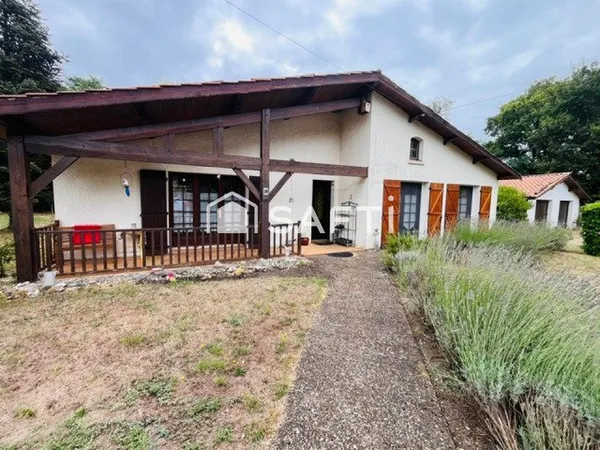 Maison landaise 3 chs, double garage, sur 3280m² terrain arboré.