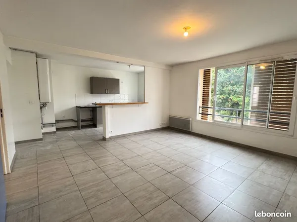 Appartement T3 de 64m² avec une place de stationnement en sous-sol - secteur Place St Jean