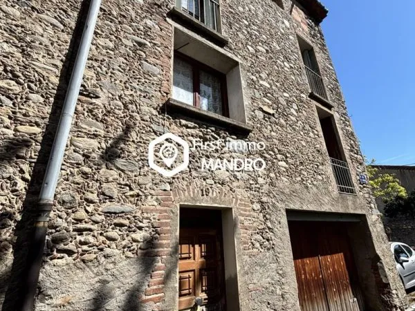 Maison de village à rénover avec garage