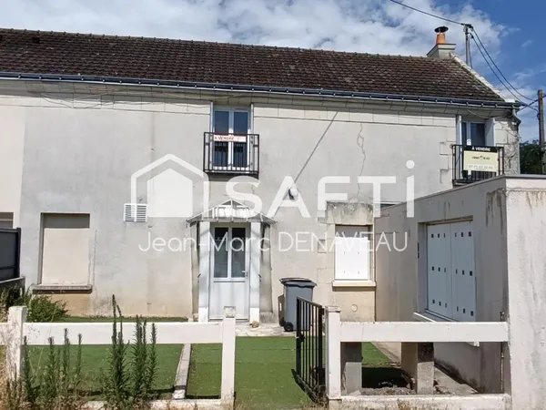 maison de ville 3 ou 4 chambres , garage