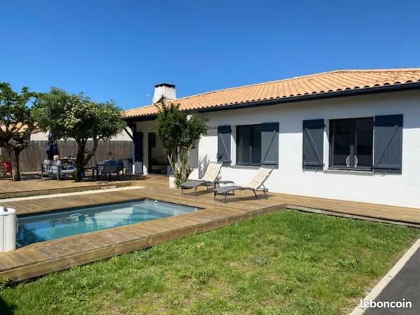 Maison de plain pied 3 chambres jardin piscine