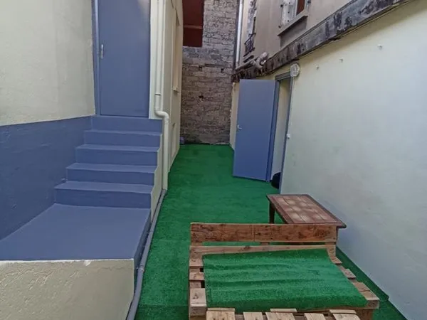 Petite maison en fond de cour à Saint-Denis