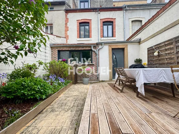 Maison proche de l'hyper centre avec extérieur