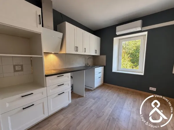 Appartement T3 rénové avec box et jardin