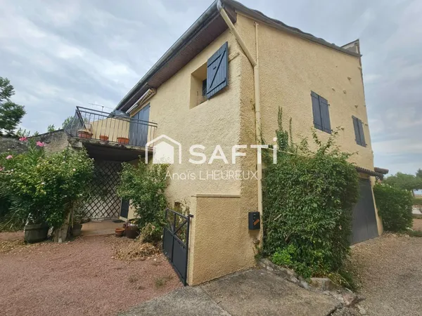 Maison de 213m2 à Lacrost avec local commercial