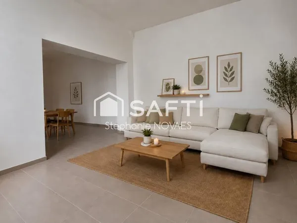 Appartement haussmannien rénové avec terrasse rare en plein coeur de Béziers.