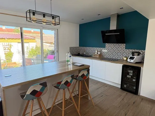 Maison avec petit jardin et garage