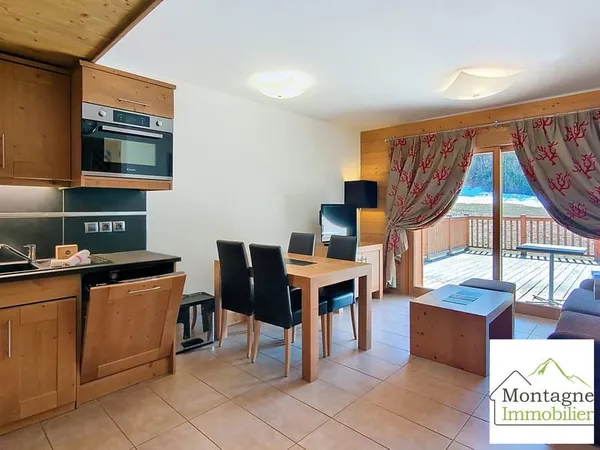 Appartement type 2 avec cave et stationnement