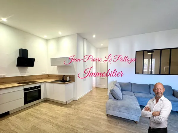 IMMEUBLE AVEC APPARTEMENT ET LOCAL COMMERCIAL