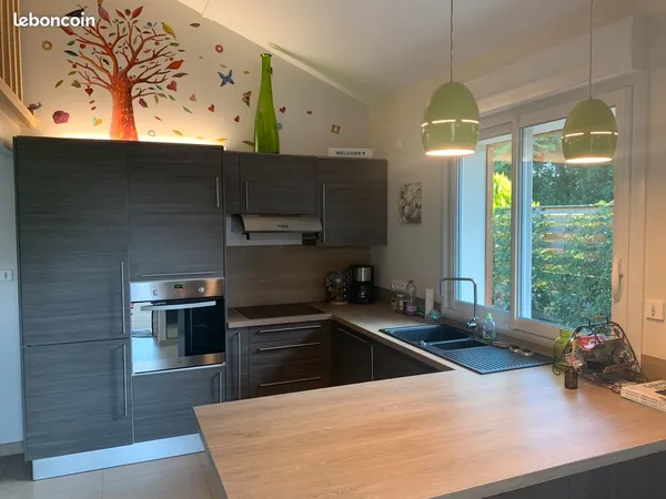 Au centre de St Romain de Jalionas appartement T2 en duplex