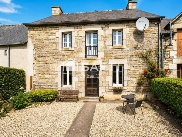 Belle maison mitoyenne au coeur du bourg
