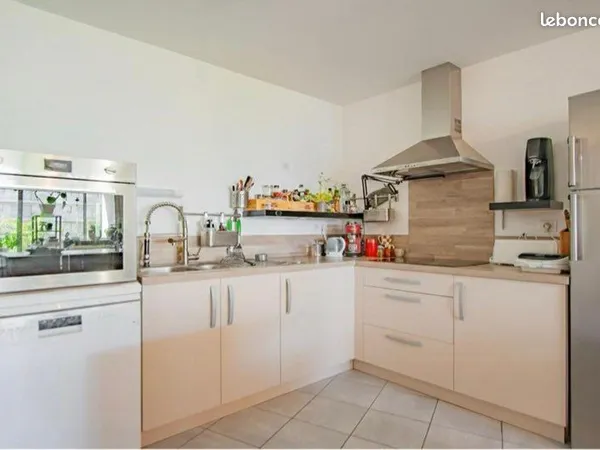 T3 56 m² - Île de Nantes - Balcon plein Sud - résidence récente