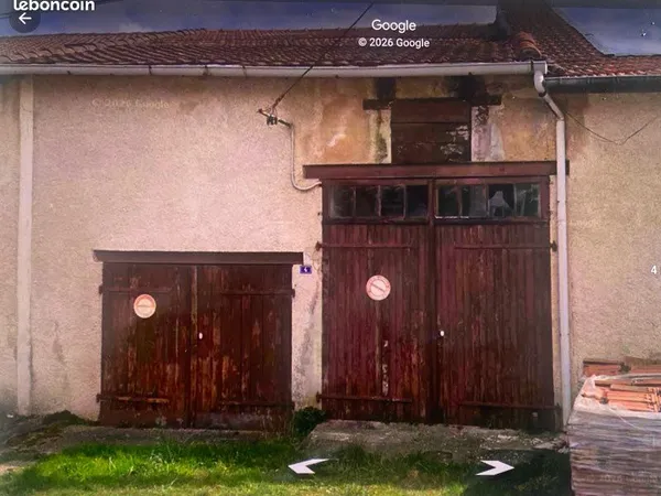 Grange mitoyenne avec terrain clos