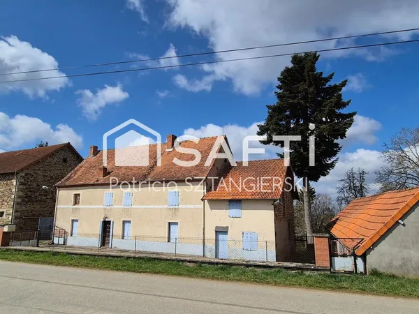 Une maison familiale pleine de caractère, 160 m², 5 chambres, garage 250 m² sur 2 niveaux, proche du