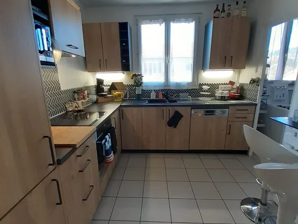 Appartement - 78m² + place parking privative