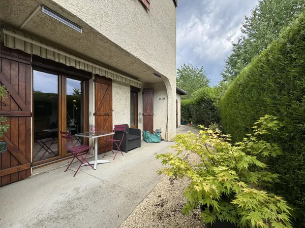 Appartement en rez-de-jardin avec garage et cave