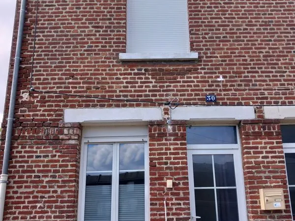 Maison mitoyenne jardinet