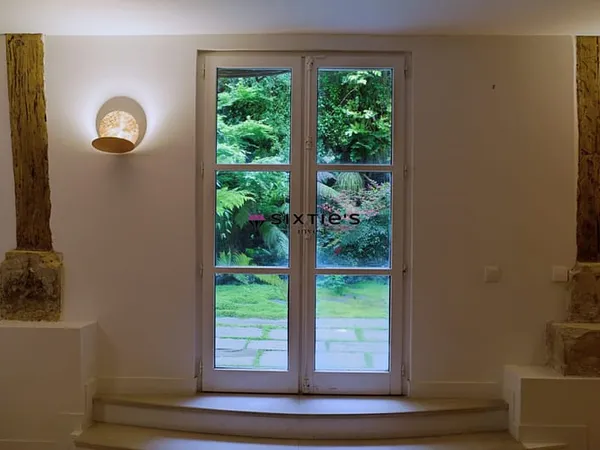 Exceptionnel : 288 m² avec jardin privatif au coeur du Marais,