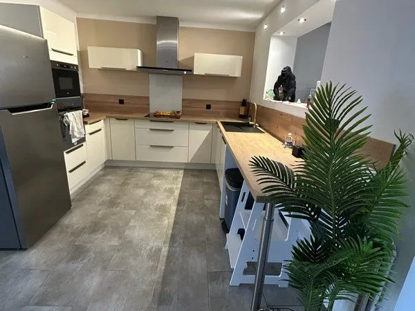Maison 110 m2 avec garage et jardin