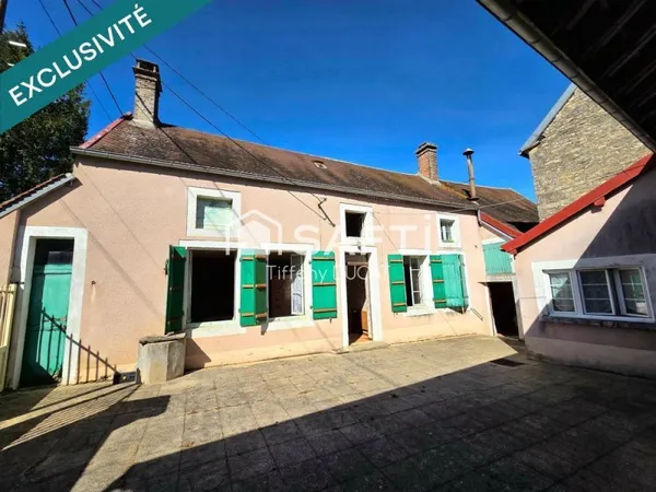 Maison avec dépendances et verger à rénover