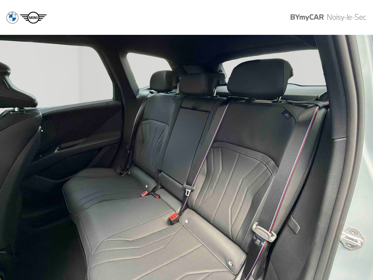 BMW iX3 50 xDrive — photo 12