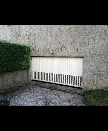 Place de parking dans un garage commun fermé