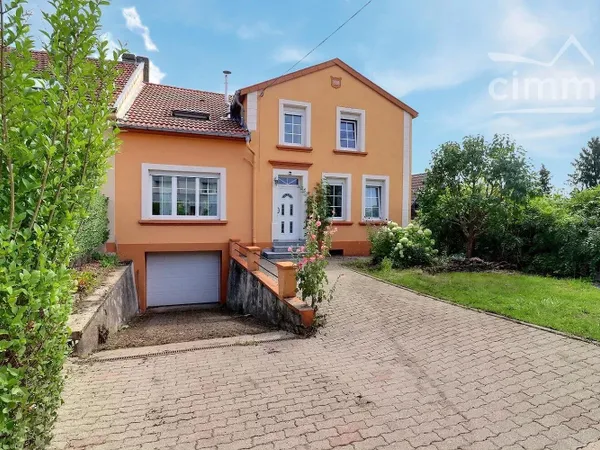 Maison semi- mitoyenne d'une surface de 169.47 m² à FOLKLING peu énergivore, offrant une excellente 