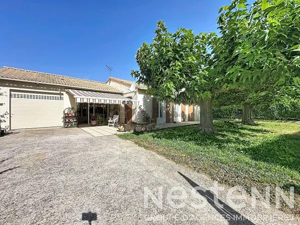 Maison de plain-pied 108 m² sur beau terrain sans vis-à-vis avec garage et véranda