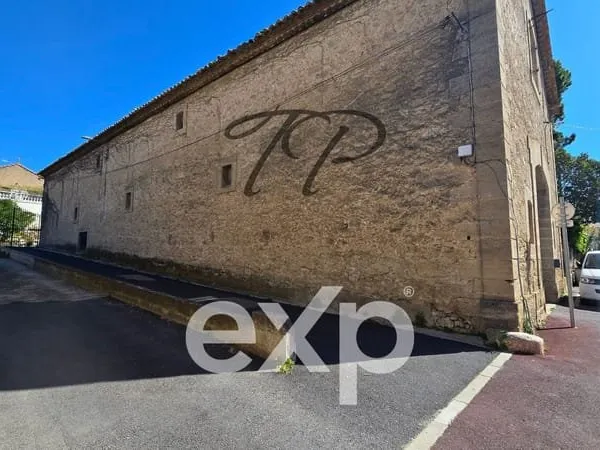 MAISON DE VILLE AVEC GARAGE DE 300M²