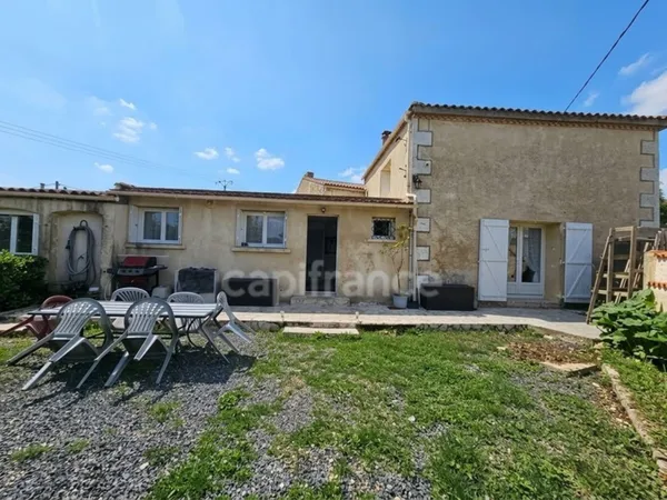 Maison charentaise rénovée de 130 m², 4 chambres, garage et jardin clôturé
