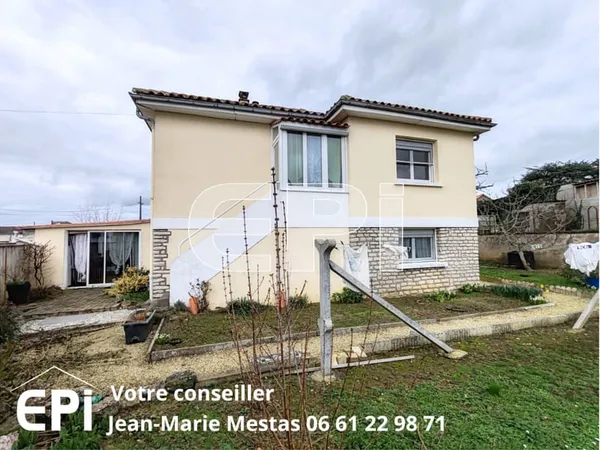 Niveau principal: cuisine, séjour, véranda, 2 chambres, salle