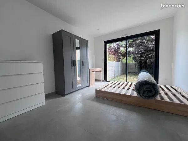 Appartement F1 neuf avec jardin, à deux pas du RER A Houilles